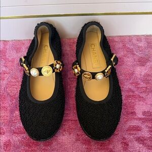CHANEL Black Boucle Flats with Gold and Pearl Details